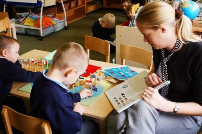 pupils-with-a-teacher-in-class